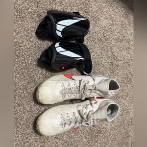 soccer cleats and shin gaurds